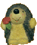 hedgehog with rose. copyright tricia donovan, 2002